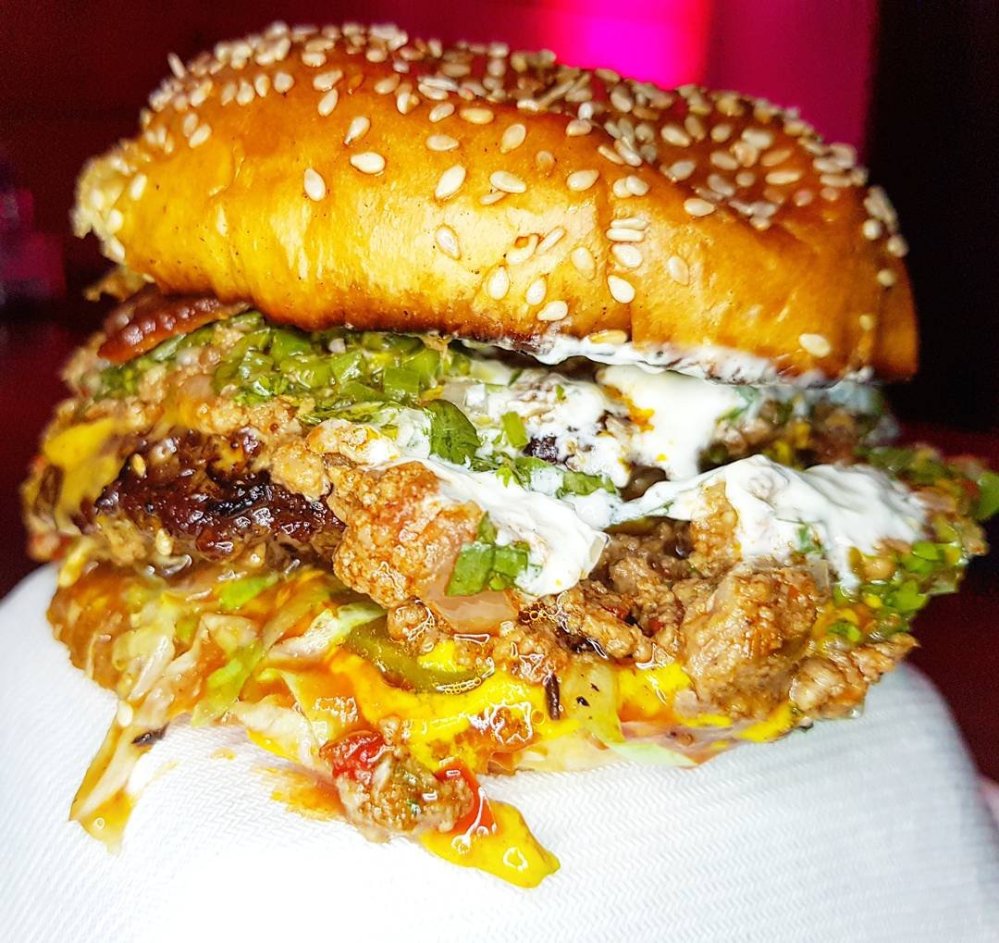 *No.007 - Signature Beef Patty, American Cheese, House Chilli, Chimichurri, Sour Cream, Lettuce, Tommy K, Mustard & Pickles 